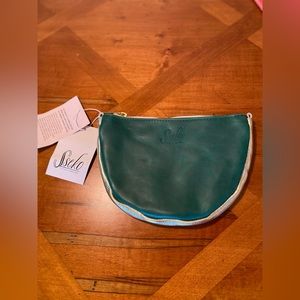Sseko handcrafted leather pouch